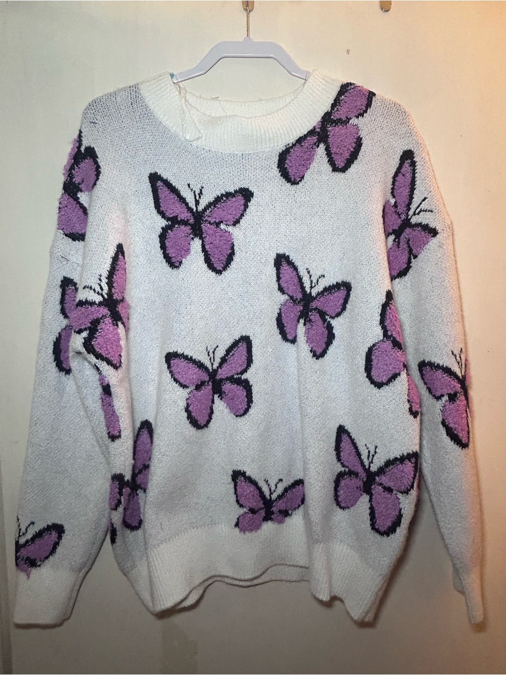 Cozy White Sweater with Purple Butterfly Motif
